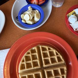 Sunrise Cafe - Cinnamon crunch waffle with fresh banana and strawberries