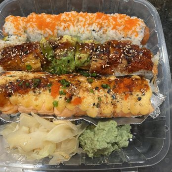 IV Sushi Togo - Lion king roll (bottom in foil) Dragon roll (middle) Salmon Avocado roll (top) - Sushi Bars Near Me - Danville, California