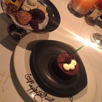 Gary Danko - On the house anniversary chocolate mousse and dessert platter - New American Near Me - San Francisco, California