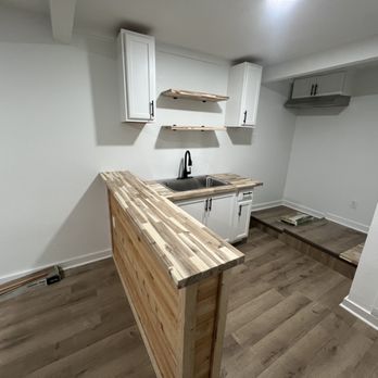 Austin Prime Carpentry - Custom cedar plank wrapped kitchen mini bar - Carpenters Near Me Austin Prime Carpentry - Custom cedar plank wrapped kitchen mini bar - Carpenters Near Me