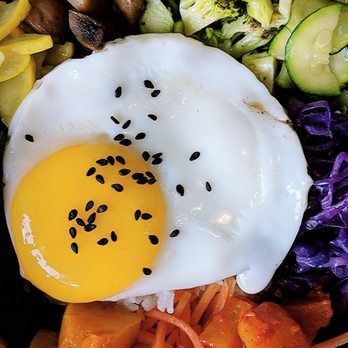 Bopbox - Mom's Medley (Stone Pot): sautéed zucchini, red cabbage, carrots, mung beans, kale, eggplant, corn, yellow beet, broccoli stems, & sunny egg - Asian Fusion Near Me - Seattle, Washington