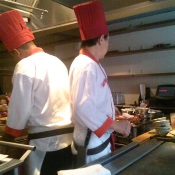 Benihana - two chefs preparing food in a commercial kitchen - Teppanyaki Near Me - The Bronx, New York