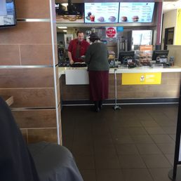 a man and a woman ordering food