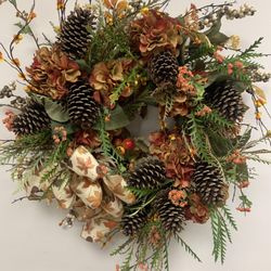 Solomon’s Porch Florist & Gifts - Stop in for seasonal Wreath selections.