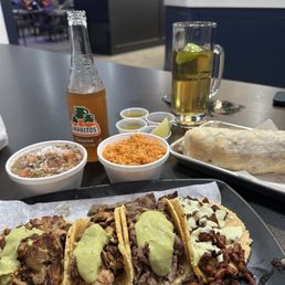 Taco flight was so good!  Carnitas, pollo, carne asada, and adobada tacos