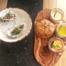 Restaurant Aji - Oyster - sesame, scallions, vinegar sambai  Corn bread - aioli, tomato, olive oil
