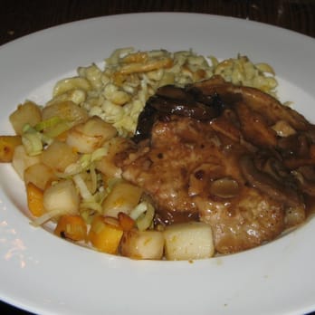 The Berghoff Restaurant - Jagerschnitzel - Pork Cutlet, Mushrooms, Bacon, Jagermeister Sauce, Caramelized Vegetables and Spaetzels - Bars Near Me - Chicago, Illinois The Berghoff Restaurant - Jagerschnitzel - Pork Cutlet, Mushrooms, Bacon, Jagermeister Sauce, Caramelized Vegetables and Spaetzels - Bars Near Me - Chicago, Illinois