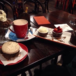 Chocolateria San Churro - (Left to right) A chocolate Sundae, macaroon ice cream sandwich, Spanish caramel hot chocolate, and a lava cake. Yummi!