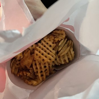 Chick-fil-A - ows a person holding a basket of chicken and waffles - Fast Food Near Me - Dublin, Ohio