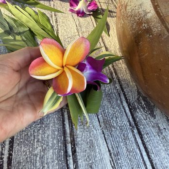 Germaine's Luau - The flower hair piece was beautiful and they placed them in our hair. - Hawaiian Near Me - Kapolei, Hawaii Germaine's Luau - The flower hair piece was beautiful and they placed them in our hair. - Hawaiian Near Me - Kapolei, Hawaii