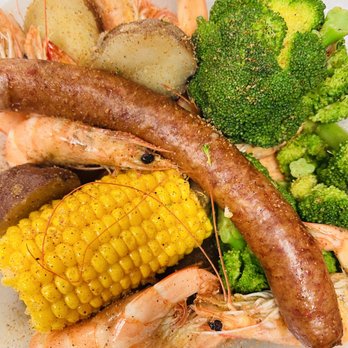 Mudbugs - At the Loop - a plate of food - Seafood Markets Near Me - Mobile, Alabama