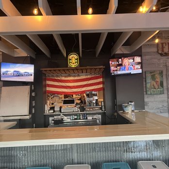 Reef and Barrel - a bar with stools in front of it - American Near Me - Manasquan, New Jersey