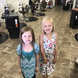 Tangles - Two happy little ladies after their hair appointments.