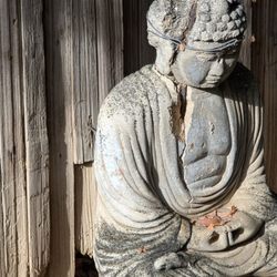 Moorten Botanical Garden - Repaired Buddha statue near the bathrooms