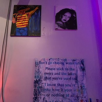 Arts' on the Ave -  woman's face and a quote on the wall - Cocktail Bars Near Me - Cincinnati, Ohio