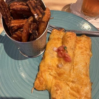 FINS Seafood & Dive Bar - Overdone Seafood Enchiladas - Seafood Near Me - Cape Coral, Florida FINS Seafood & Dive Bar - Overdone Seafood Enchiladas - Seafood Near Me - Cape Coral, Florida