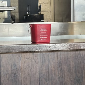 Pizza Factory - sanitation Bucket on counter next to salad Bar - Pizza Near Me - Lone Pine, California Pizza Factory - sanitation Bucket on counter next to salad Bar - Pizza Near Me - Lone Pine, California