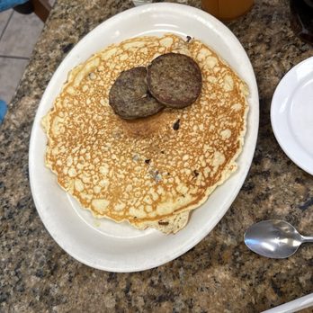 Blue Bonnet Cafe - Blueberry pancake with sausage - Desserts Near Me - Marble Falls, Texas Blue Bonnet Cafe - Blueberry pancake with sausage - Desserts Near Me - Marble Falls, Texas