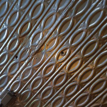 Monaghan's Bar and Grill - Possibly bullet holes in the ceiling. - Bars Near Me - Sheridan, Colorado