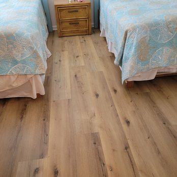 Moores Custom Flooring - two beds in a bedroom - Flooring Near Me Moores Custom Flooring - two beds in a bedroom - Flooring Near Me