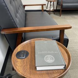 Center For Reproductive Health & Gynecology - Waiting area where each table has a place to charge your electronics, how thoughtful! Just remember to bring your cord.