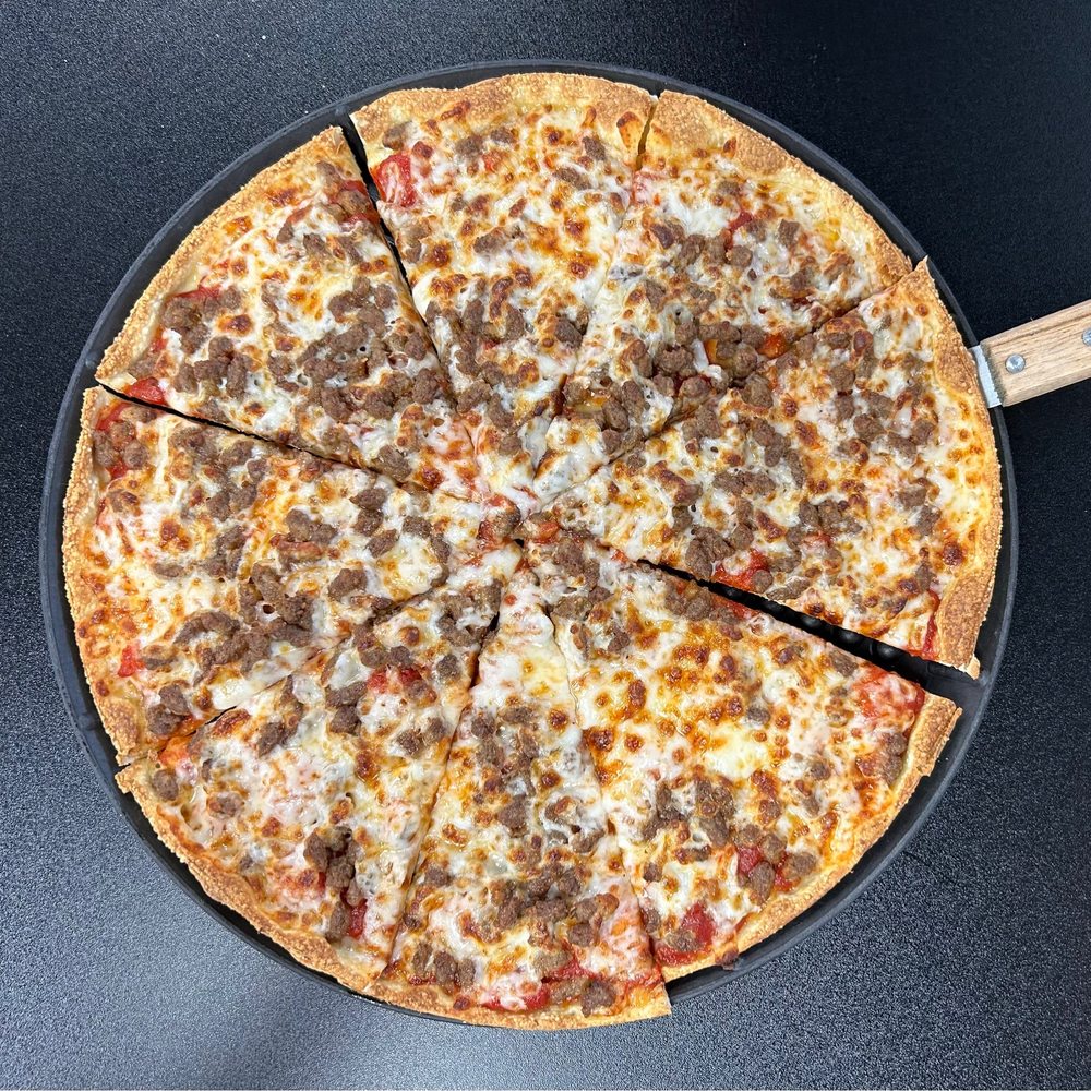 Simple Simon's Pizza - a sausage and cheese pizza - Pizza Near Me - Wagoner, Oklahoma Simple Simon's Pizza - a sausage and cheese pizza - Pizza Near Me - Wagoner, Oklahoma