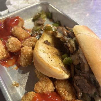 Mango Marley's - Philly cheesesteak & tots - American Near Me - Mexico Beach, Florida