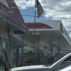 Conoco gas station. Gunsmoke is the food, souvenir, music/DVD, clothing, and cafe shop located adjacent.