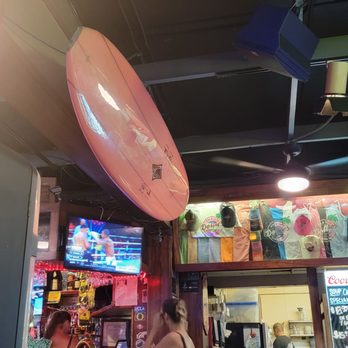 Dollies Pub & Cafe - Bar area, nice board. - Pizza Near Me - Lahaina, Hawaii Dollies Pub & Cafe - Bar area, nice board. - Pizza Near Me - Lahaina, Hawaii