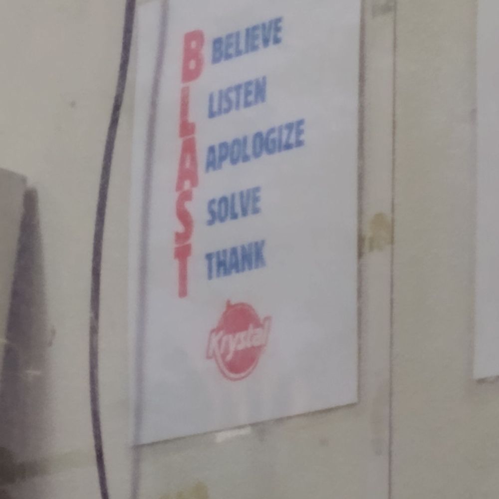 This sign that is visible at the drive thru window is posted to remind the employees to: Believe Listen Apologize Solve Thank This sign that is visible at the drive thru window is posted to remind the employees to: Believe Listen Apologize Solve Thank