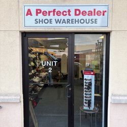 Exterior view of our customer entrance to A Perfect Dealer's Shoe Warehouse store