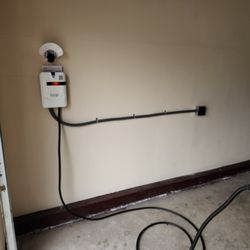 Wiseco Electric - Electric vehicle (EV) charger installed in a garage