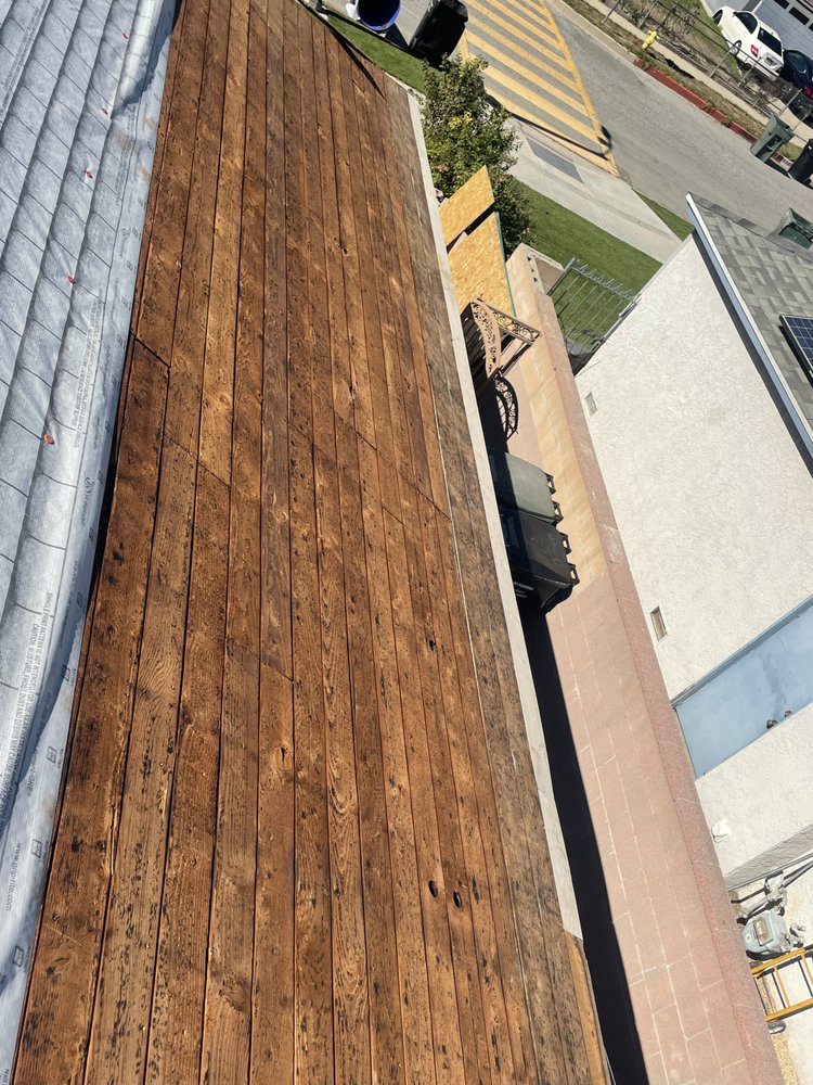 Slide of EZ Roof Repairs