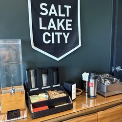 Urban Sailor Coffee - Cream and sugar station with self serve water