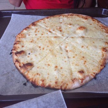 Taza Bakery - Cheese pizza ( comes with no sauce, just cheese) - Bakeries Near Me - Chicago, Illinois Taza Bakery - Cheese pizza ( comes with no sauce, just cheese) - Bakeries Near Me - Chicago, Illinois