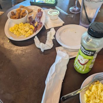The Dining Experience - Eggs scrambled with cheese, breakfast potatoes, bacon, and wheat toast - Breakfast & Brunch Near Me - Fairburn, Georgia