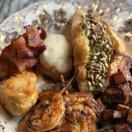 Shrimp skewers, potatoes, chicken salad croissant, bacon, puff pastry filled