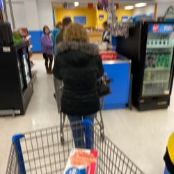 Dollar General - Here we go again with this Walmart. Lines all over with only three registers open. People with yellow vests just watching.