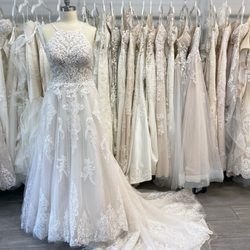 Rina's Bridal Boutique - Designer wedding gowns from sizes 0-32