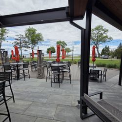 TJ's Harbor Restaurant - More outdoor seating with Lake Winnebago in the background