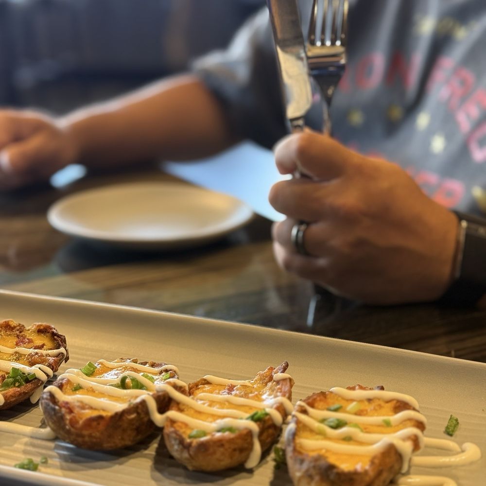 Raiders Tavern & Grill - Loaded potato skins - American Near Me - Henderson, Nevada Raiders Tavern & Grill - Loaded potato skins - American Near Me - Henderson, Nevada