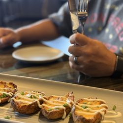 Raiders Tavern & Grill - Loaded potato skins