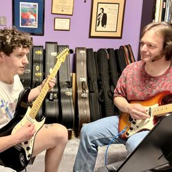 David Joel Guitar Studio - Instructing guitar student Jack C.