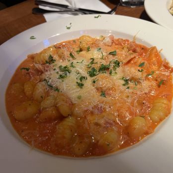 La Vita E Bella - Gnocchi al Forno Potato dumplings baked with Roma tomatoes, spinach & fresh mozzarella - Italian Near Me - Seattle, Washington La Vita E Bella - Gnocchi al Forno Potato dumplings baked with Roma tomatoes, spinach & fresh mozzarella - Italian Near Me - Seattle, Washington