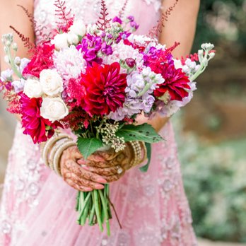 TCU Florist & Flower Delivery - Bride holding bouquet - Florists Near Me - Fort Worth, Texas TCU Florist & Flower Delivery - Bride holding bouquet - Florists Near Me - Fort Worth, Texas