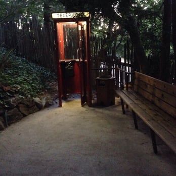 Nepenthe - Cute telephone decor in the walkway - New American Near Me - Big Sur, California