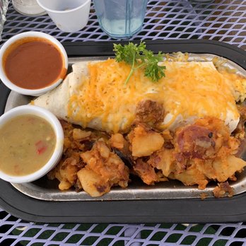 Pantry Restaurant - Breakfast burrito with red & green chile on side with red chile home fries - Breakfast & Brunch Near Me - Santa Fe, New Mexico Pantry Restaurant - Breakfast burrito with red & green chile on side with red chile home fries - Breakfast & Brunch Near Me - Santa Fe, New Mexico