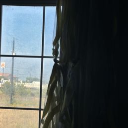 Torn curtains in the room. Torn curtains in the room.