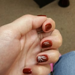 Nails Plus Dr - I asked for a design and told Julie I like lines or flowers, so she gave me both and added a little bit of sparkle! Love it!!