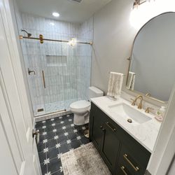 Floor & Decor - The shower floor and wall were purchased at Floor & Decor. See other picture for closer view. Read review for exact tile info.